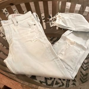 AG - light wash raw hem skinny jeans